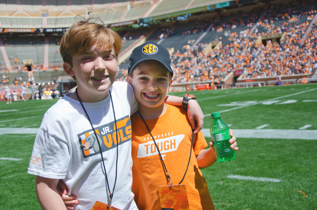 Two brace faces on the field